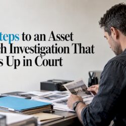 Investigator organizing case findings in an evidence matrix